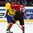 HELSINKI, FINLAND - DECEMBER 26: Switzerland's Denis Malgin #13 gets a glove up on Sweden's William Lagesson #3 during preliminary round action at the 2016 IIHF World Junior Championship. (Photo by Matt Zambonin/HHOF-IIHF Images)

